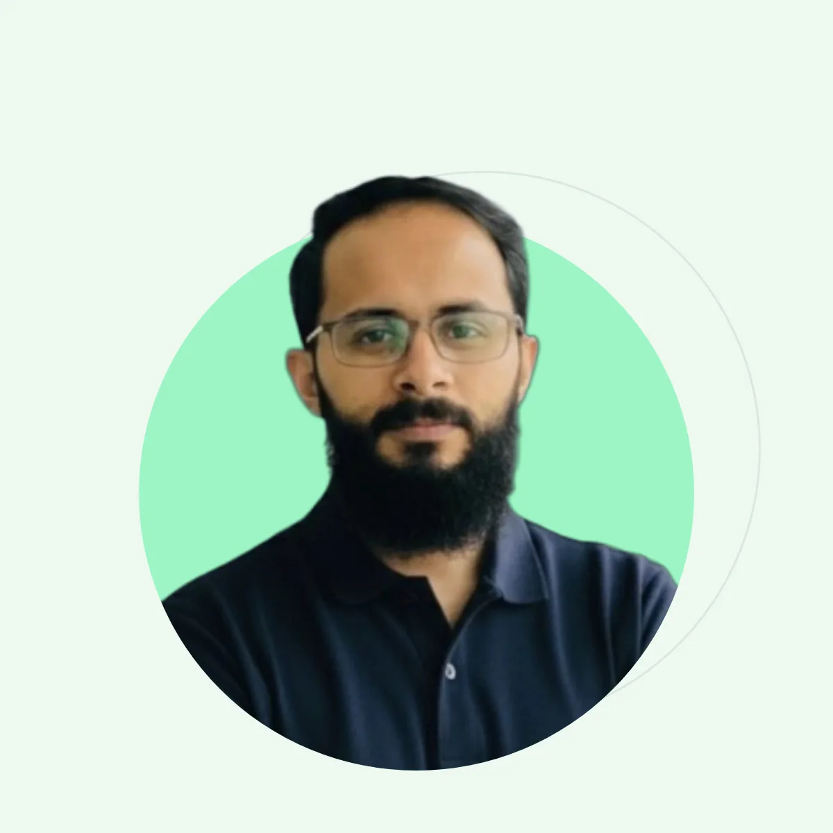 Junaid Tahir, Averolt project manager, in a navy polo shirt